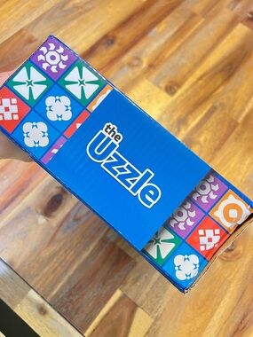 The Uzzle Puzzle Box in Bright Blue with Multicolor Tiles